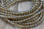 4mm Round Druk Yellow Ivory with an AB and Mercury Finish, 50pc