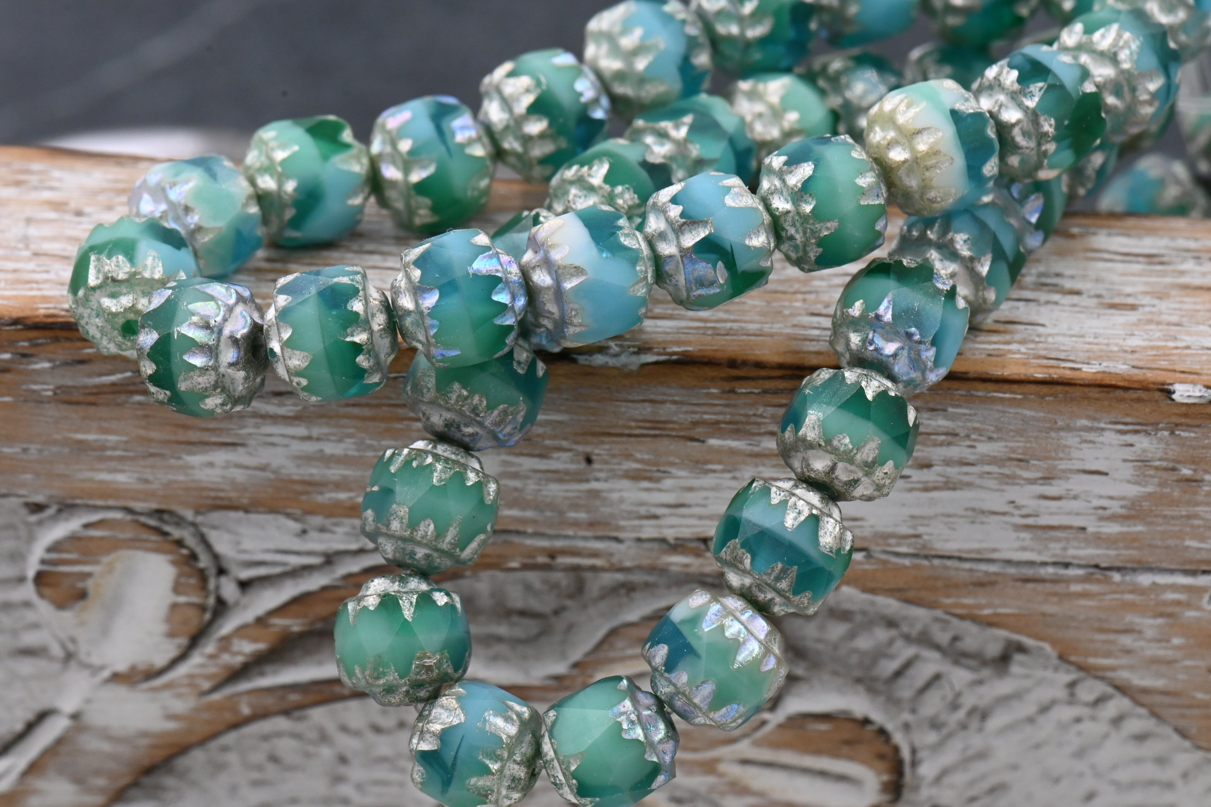 6mm Cathedral a Blend Of Sea Green, Teal, Green and Sky Blue with a Antique Silver Czech Glass Beads