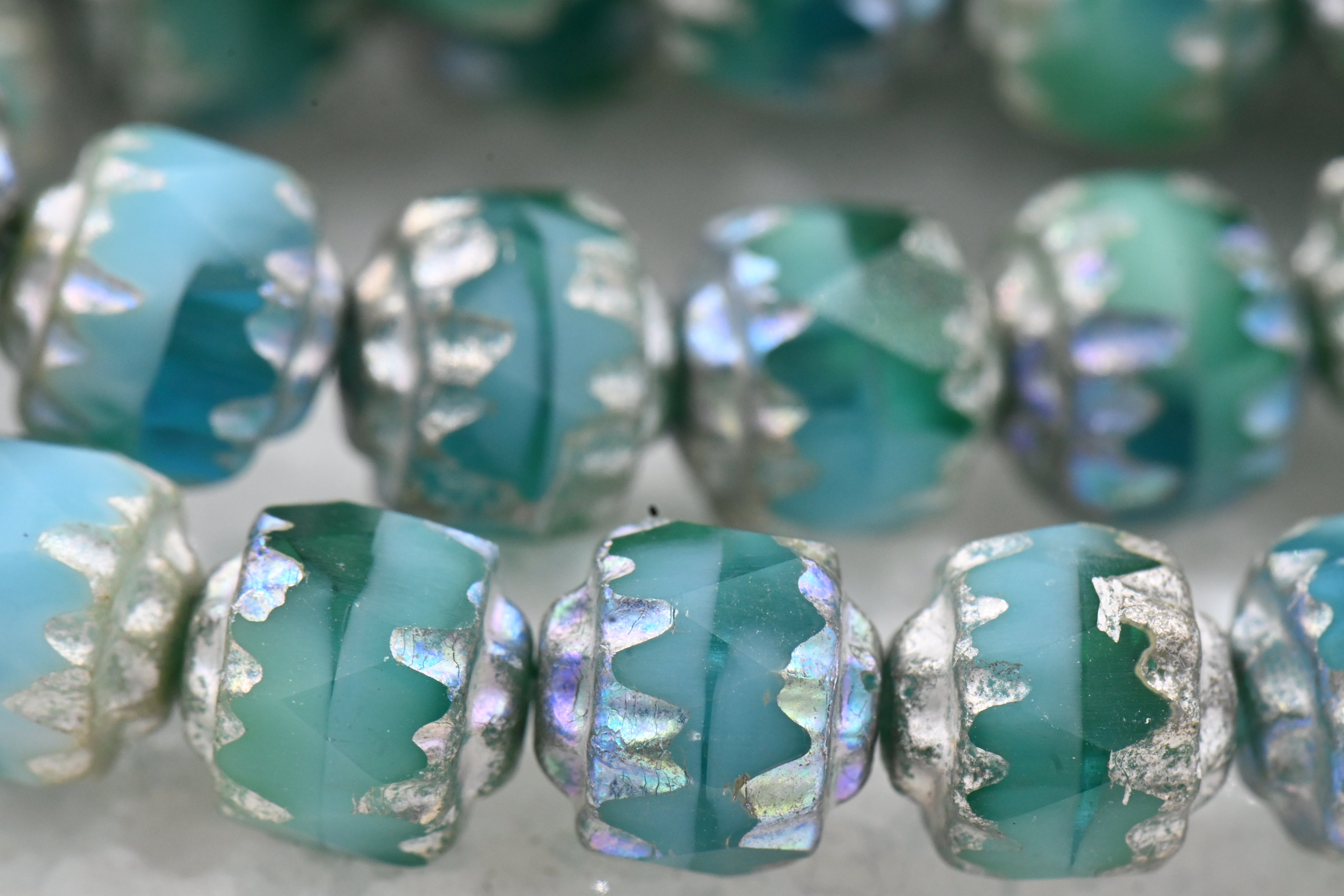 6mm Cathedral a Blend Of Sea Green, Teal, Green and Sky Blue with a Antique Silver Czech Glass Beads