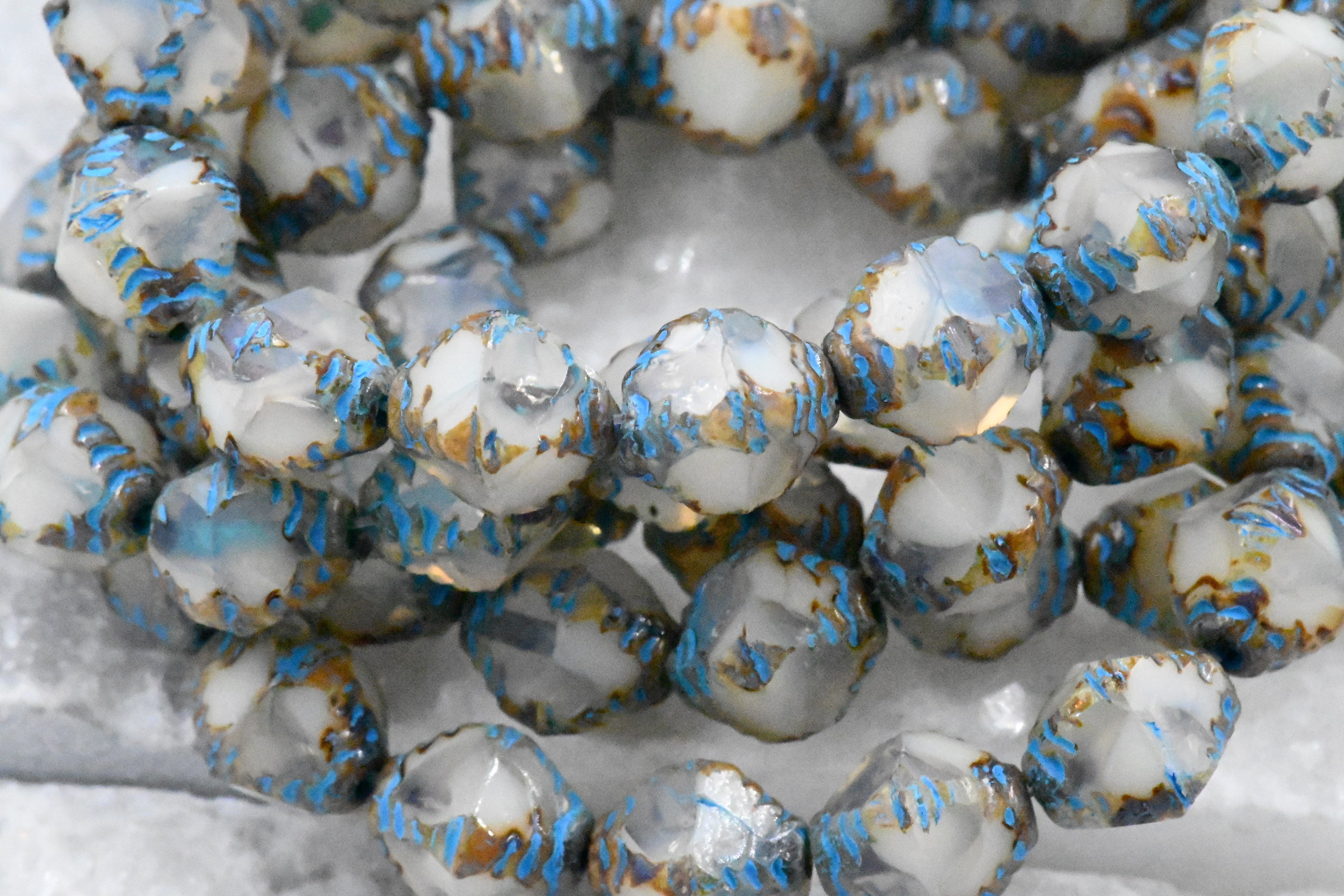15pc Faceted Bicone White with a Picasso Finish and Turquoise Wash 8x10mm Czech Glass Beads