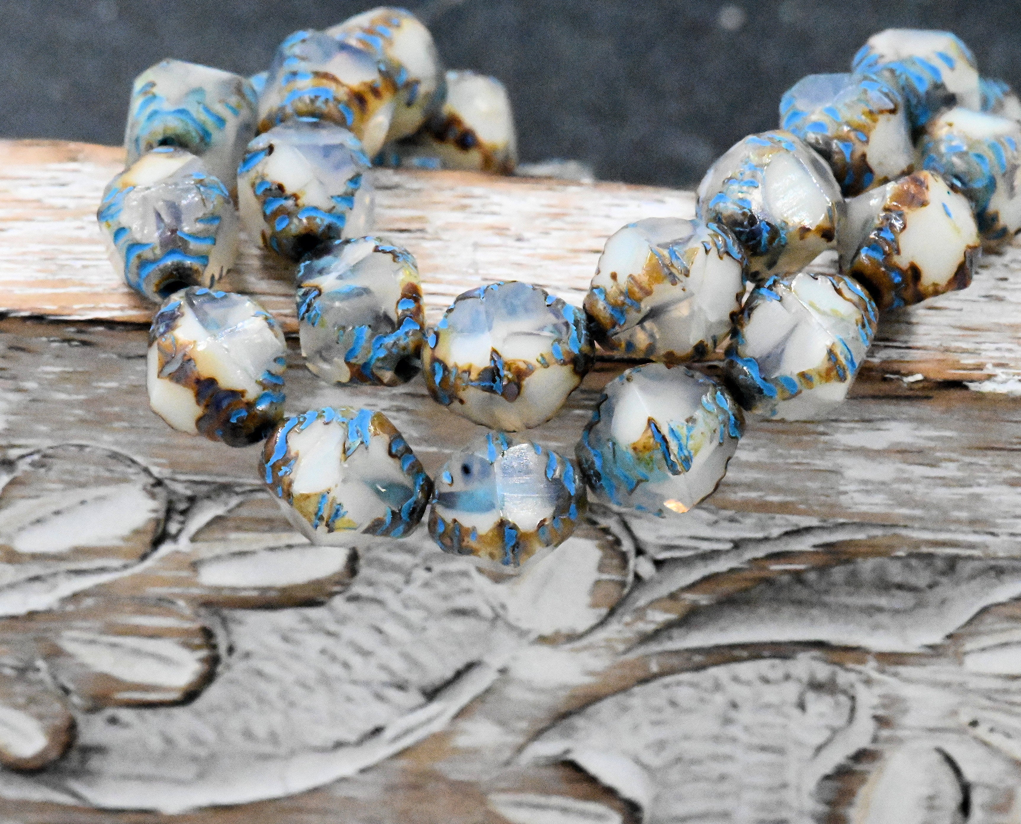 15pc Faceted Bicone White with a Picasso Finish and Turquoise Wash 8x10mm Czech Glass Beads