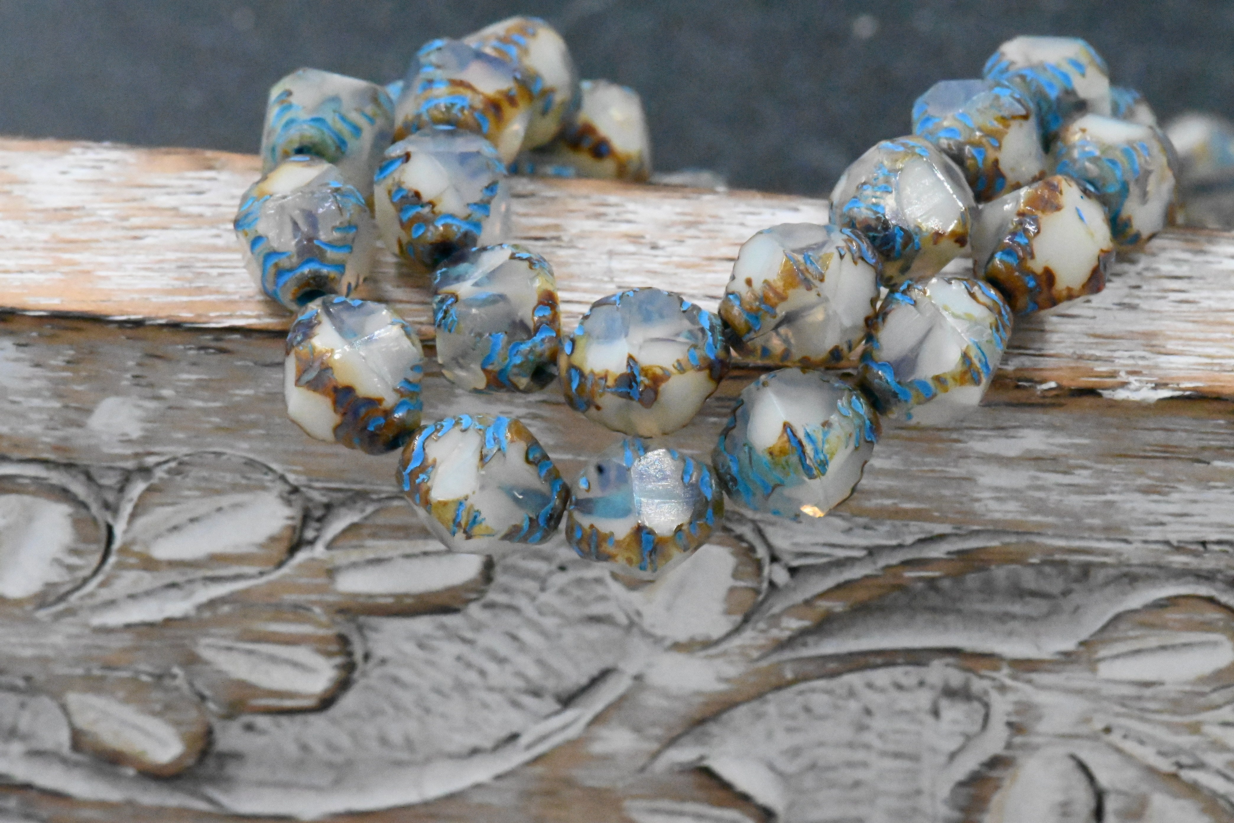 15pc Faceted Bicone White with a Picasso Finish and Turquoise Wash 8x10mm Czech Glass Beads