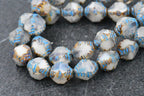 15pc Faceted Bicone White with a Picasso Finish and Turquoise Wash 8x10mm Czech Glass Beads