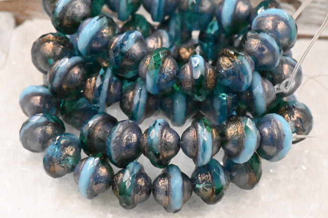15pc Czech Glass Beads 10x8mm Saturn Teal and Sky Blue with an Etched Finish and Bronze and Gold Washes Main Image
