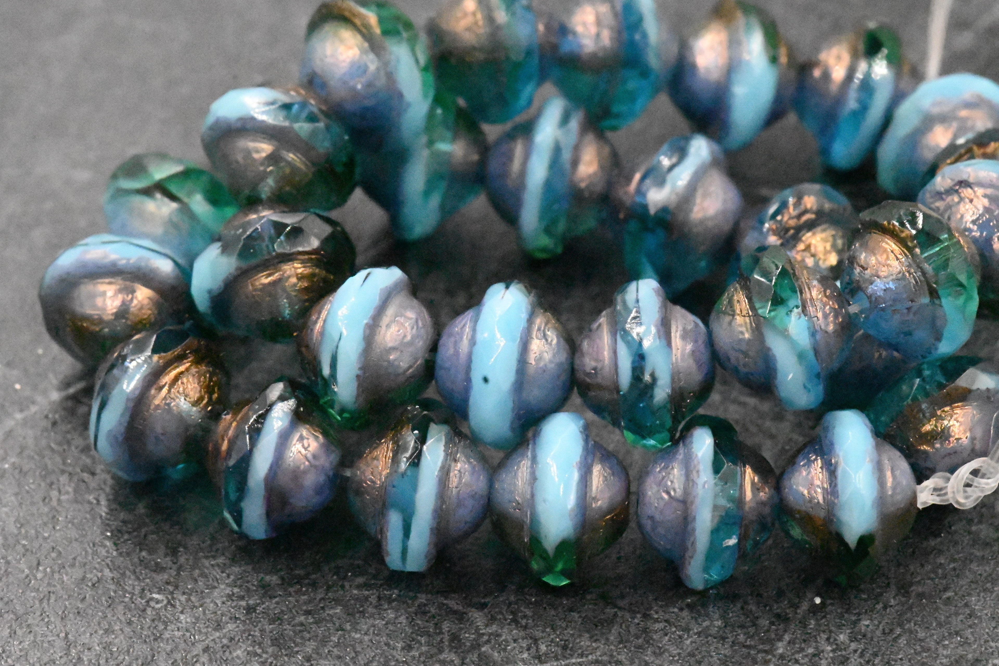 15pc Czech Glass Beads 10x8mm Saturn Teal and Sky Blue with an Etched Finish and Bronze and Gold Washes