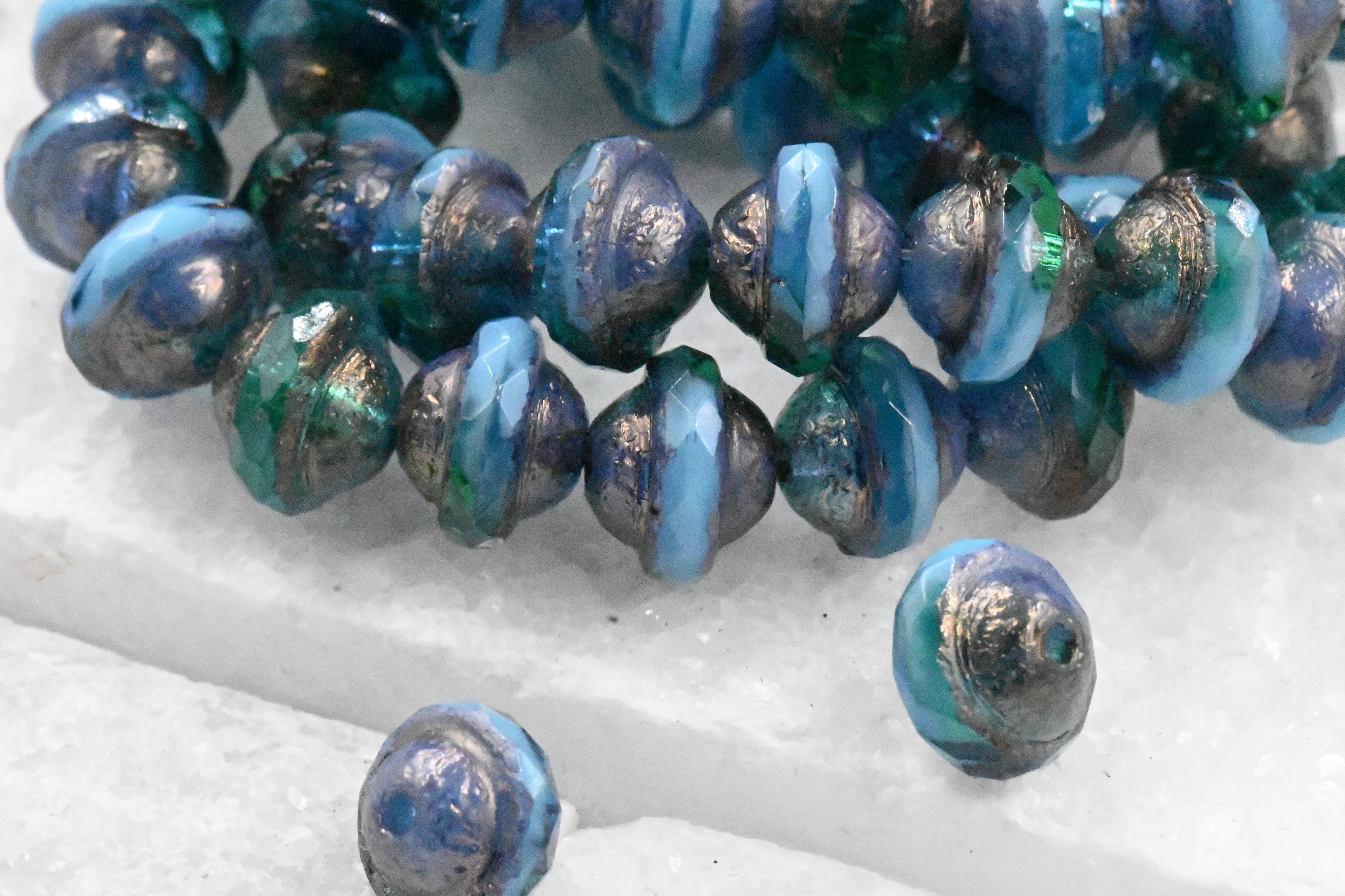 15pc Czech Glass Beads 10x8mm Saturn Teal and Sky Blue with an Etched Finish and Bronze and Gold Washes