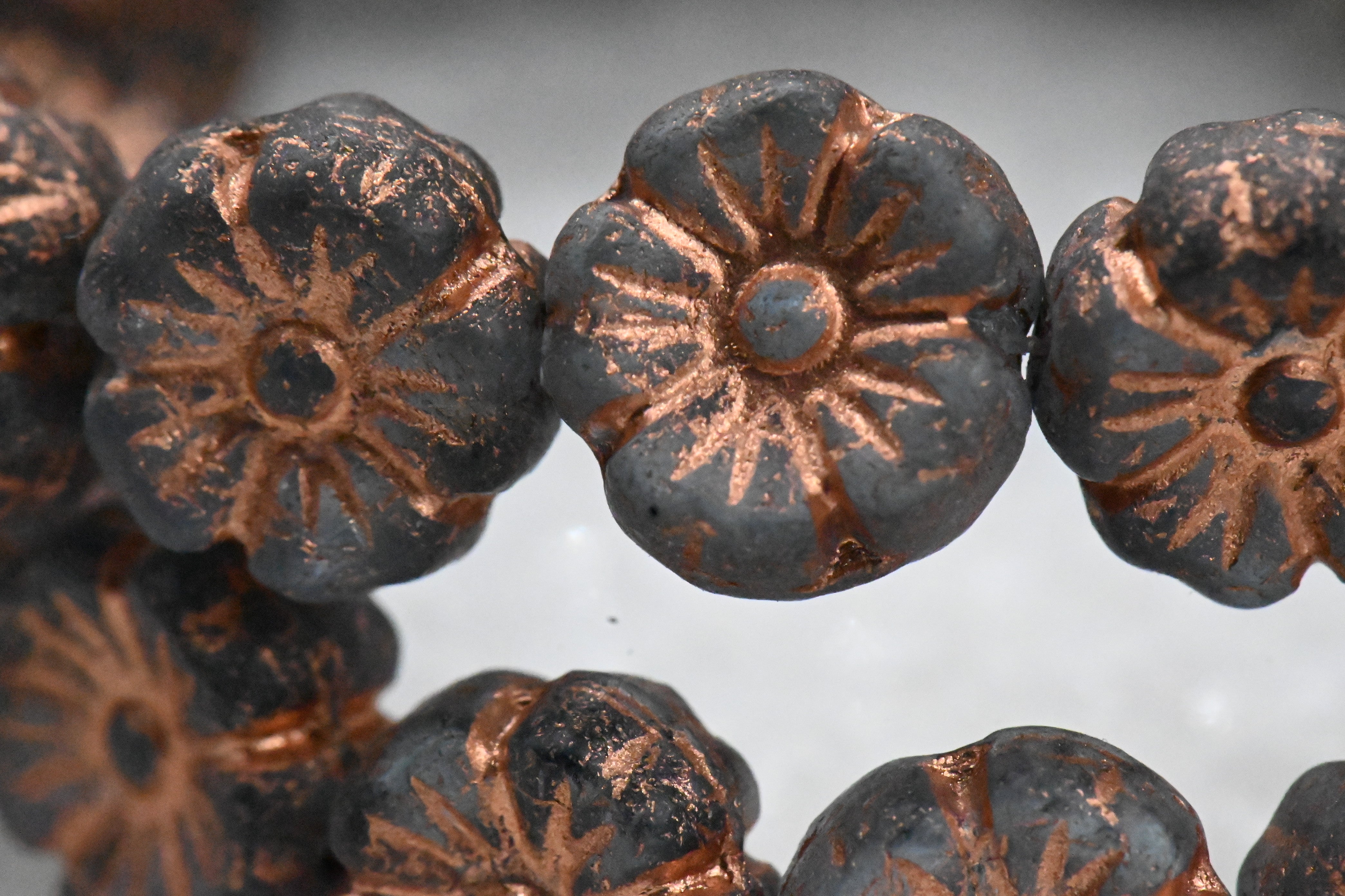 Czech Beads 9mm Hibiscus Flower Grey with an Etched Finish and a Copper Wash 16pc