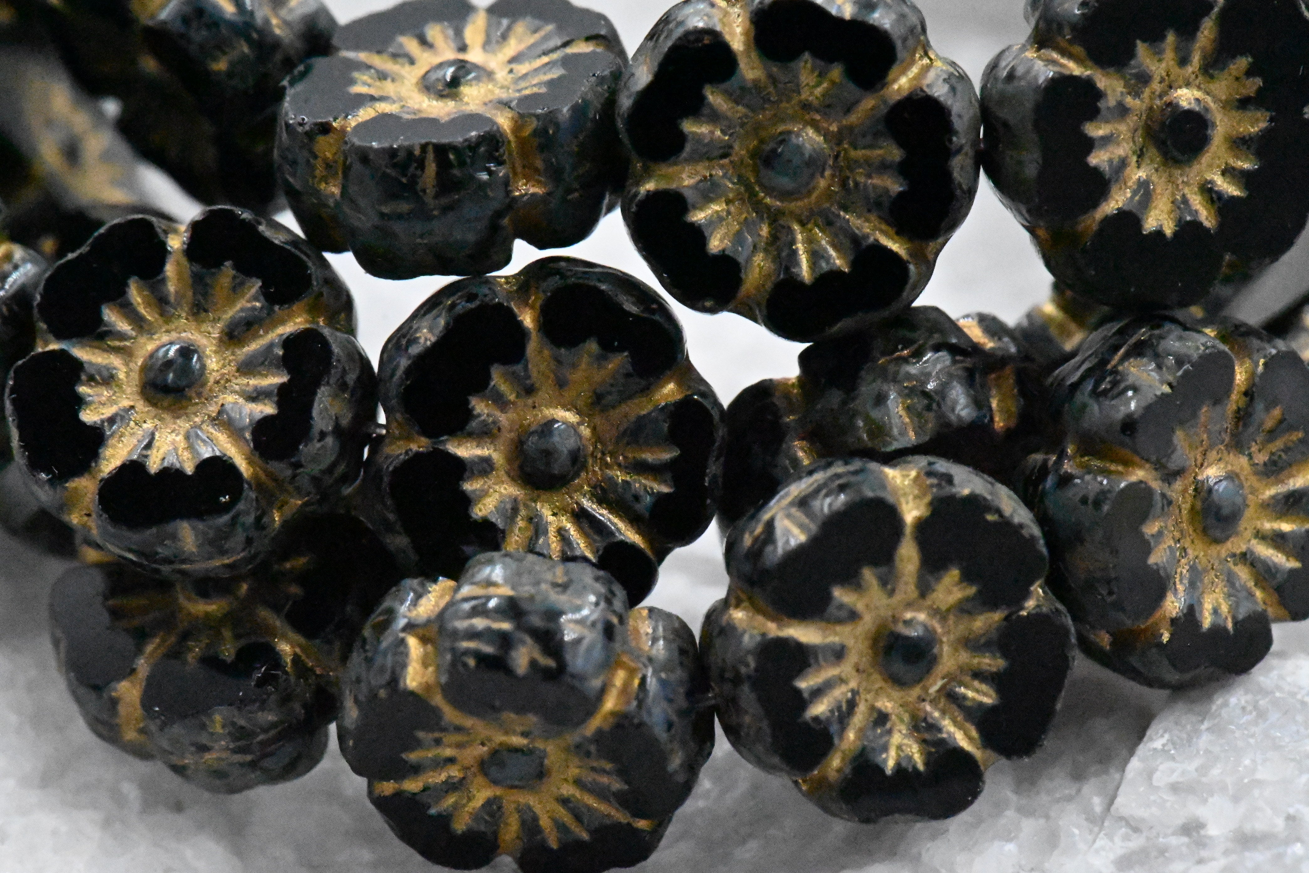 9mm Hibiscus Flower 16pc Black with a Picasso Finish and a Gold Wash Czech Glass