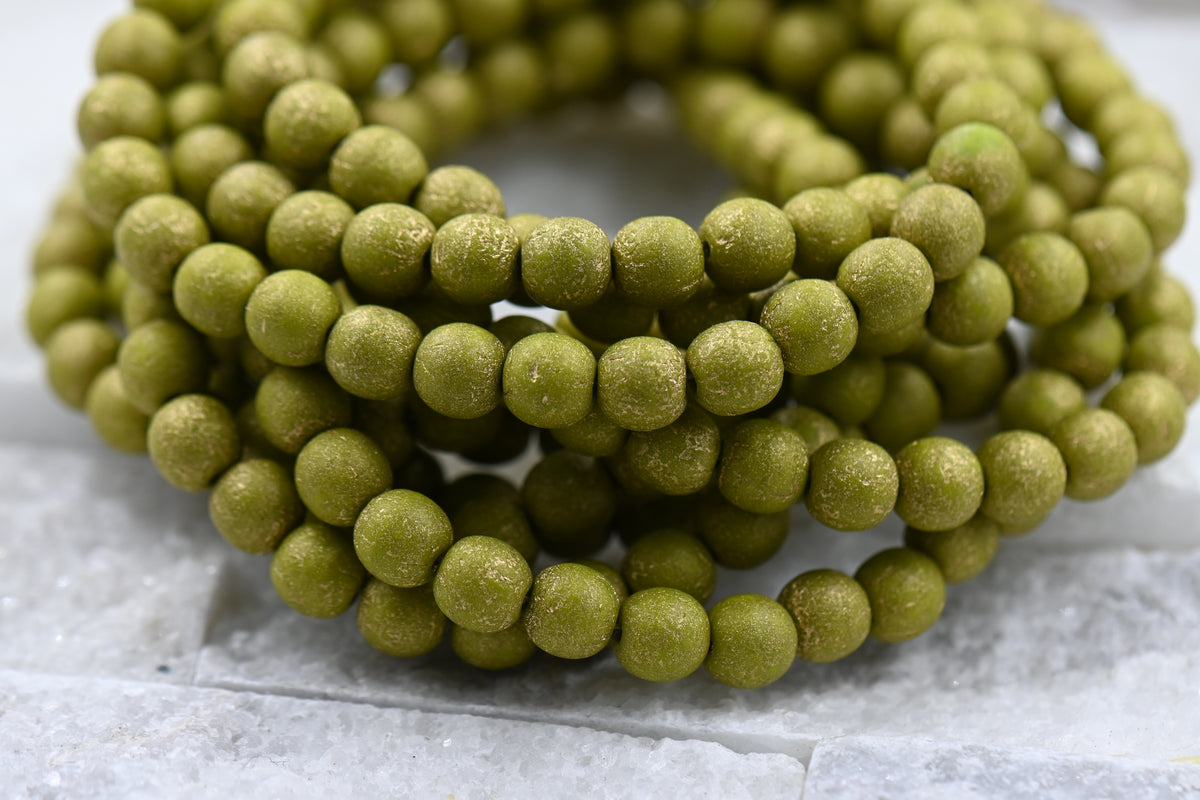 Czech 6mm Round Druk Peridot with an Etched Finish and a Gold Wash, 60