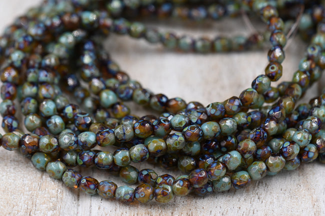 4mm Czech Faceted Round 100pc Firepolished Bead Amber and Tea Green with Picasso Finish Main Image