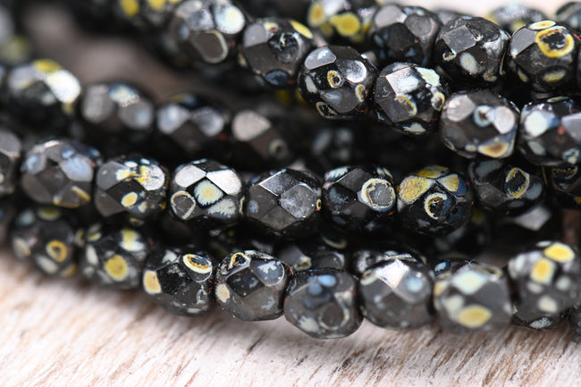 Czech 4mm Faceted 100pc Round Firepolished Bead Black with Picasso Finish Hover Image