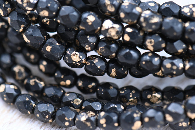 Czech 4mm Faceted Firepolished Bead 100pc Black with Gold Finish Hover Image
