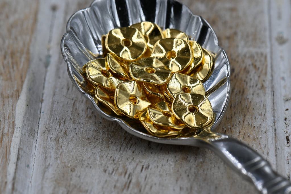 Golden 10mm Wavy Spacer Beads – 100 pcs Pack