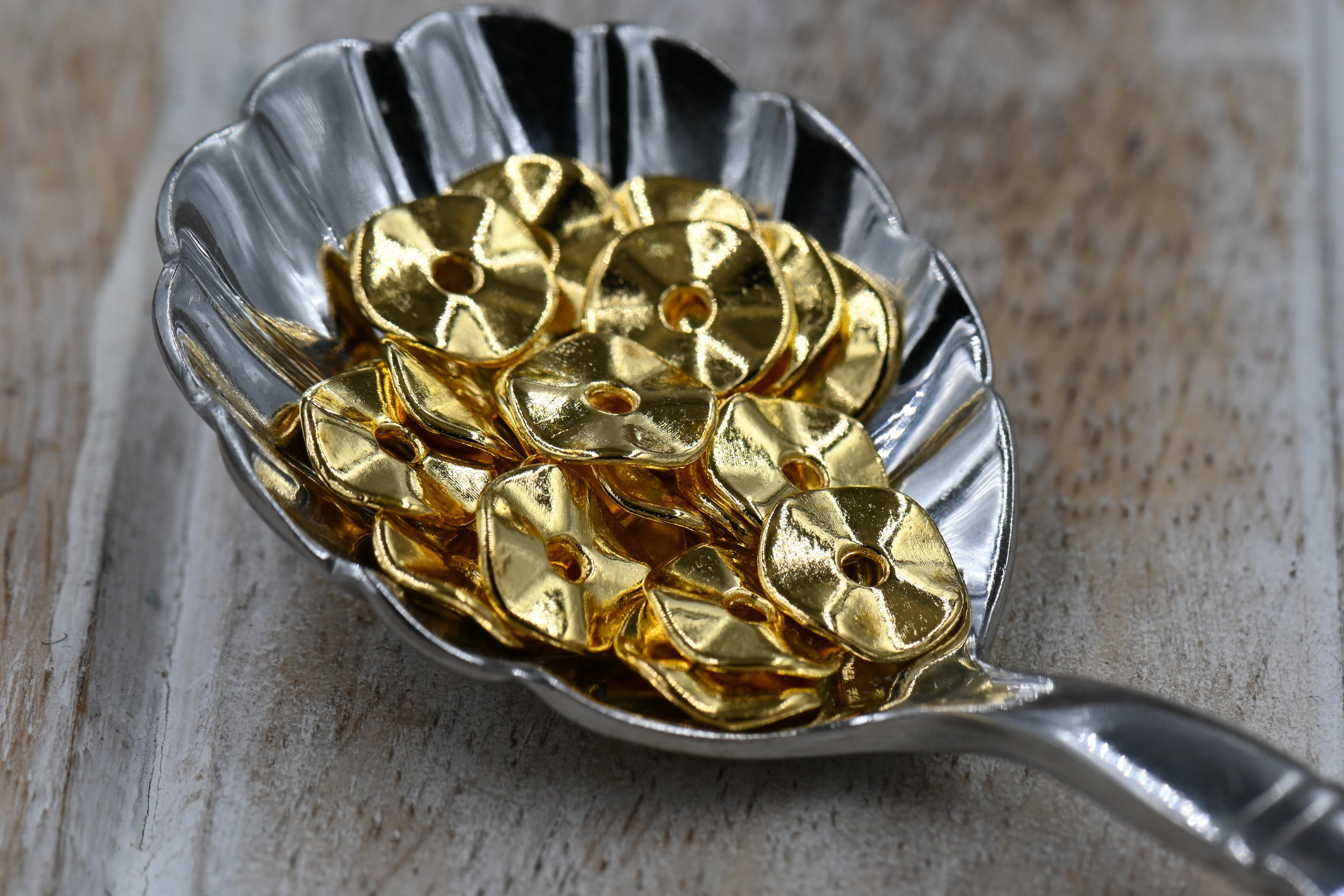 Golden 10mm Wavy Spacer Beads – 100 pcs Pack