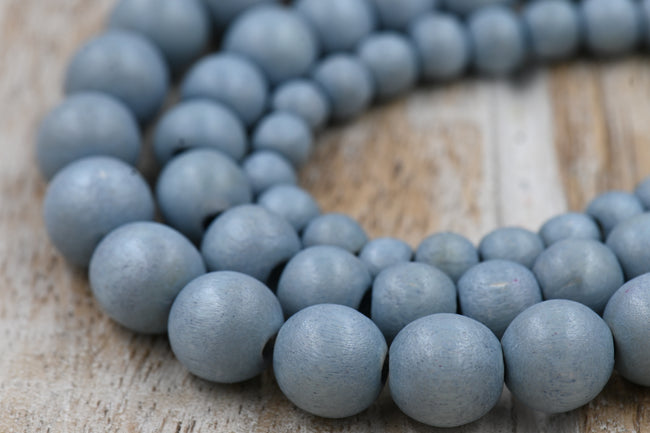 Winter Dusk Blue — Dyed Waxed Wood Beads in Soft Frosted Blue Main Image