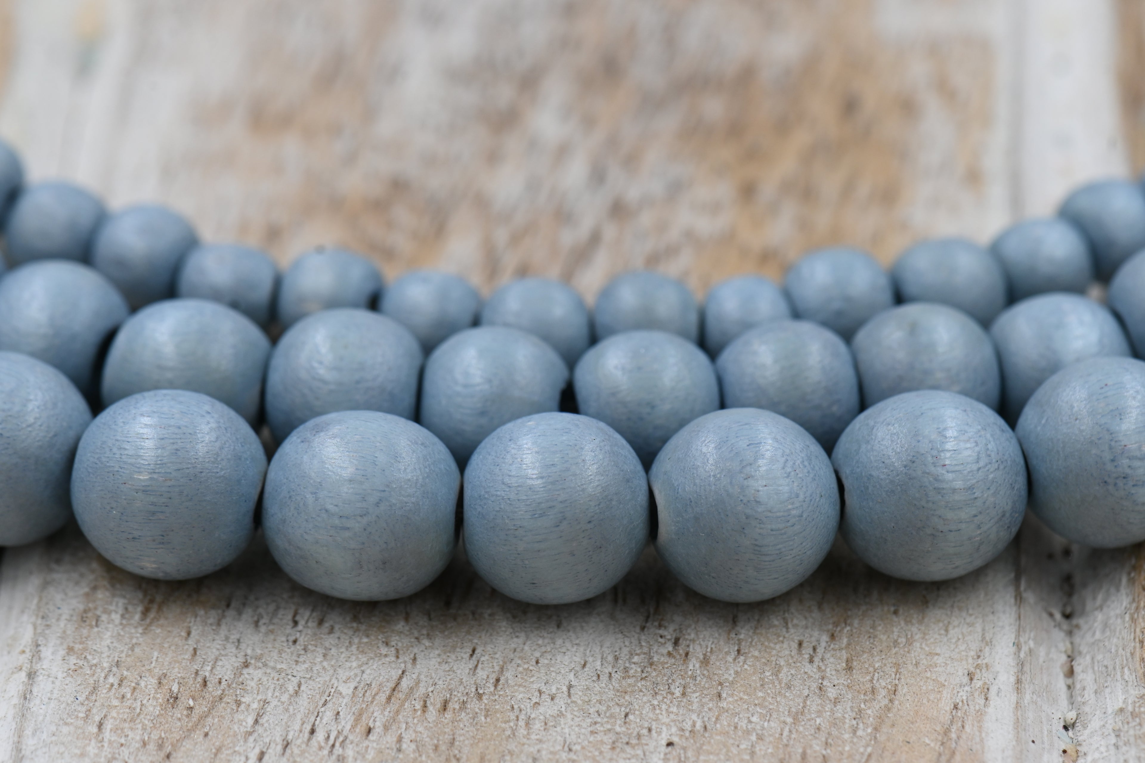 TWO STRANDS Winter Dusk Blue — Dyed Waxed Wood Beads in Soft Frosted Blue