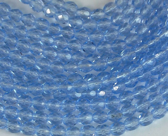 Lt. Sapphire Czech Glass Firepolished 4mm Beads -50 Hover Image