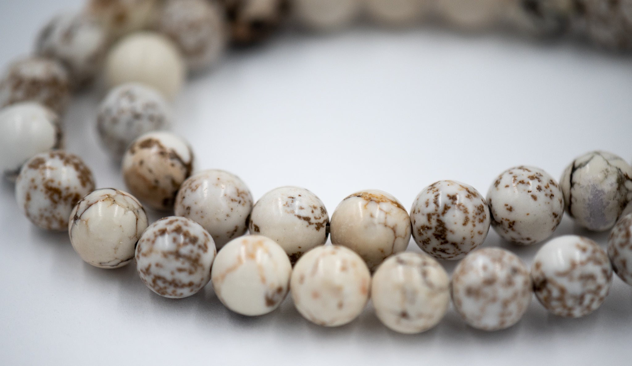 White Magnesite 6mm, 8mm Heavy Matrix White Magnesite Round Beads in Opaque Finish -15.5 inch strand