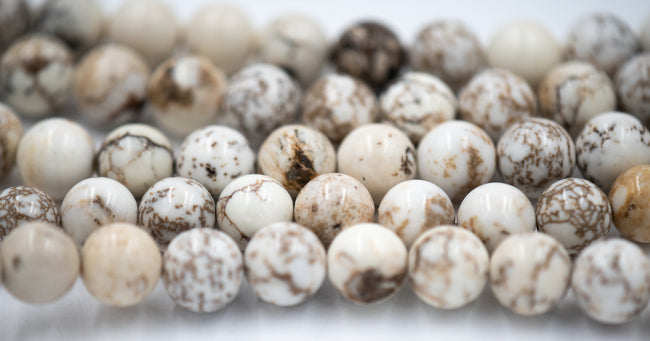 White Magnesite 6mm, 8mm Heavy Matrix White Magnesite Round Beads in Opaque Finish -15.5 inch strand Hover Image