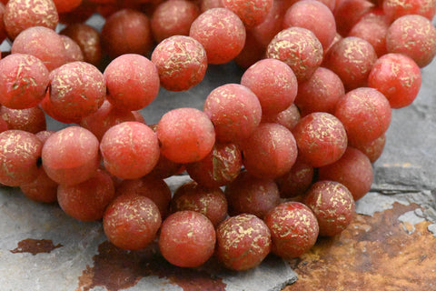 8mm Round Druk Autumn Red with an Etched Finish Gold Wash