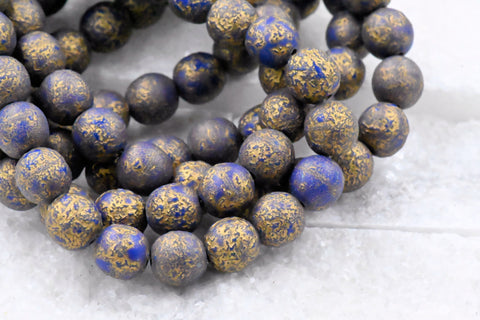 8mm Round Druk Lapis Blue with an Etched Finish Gold Wash