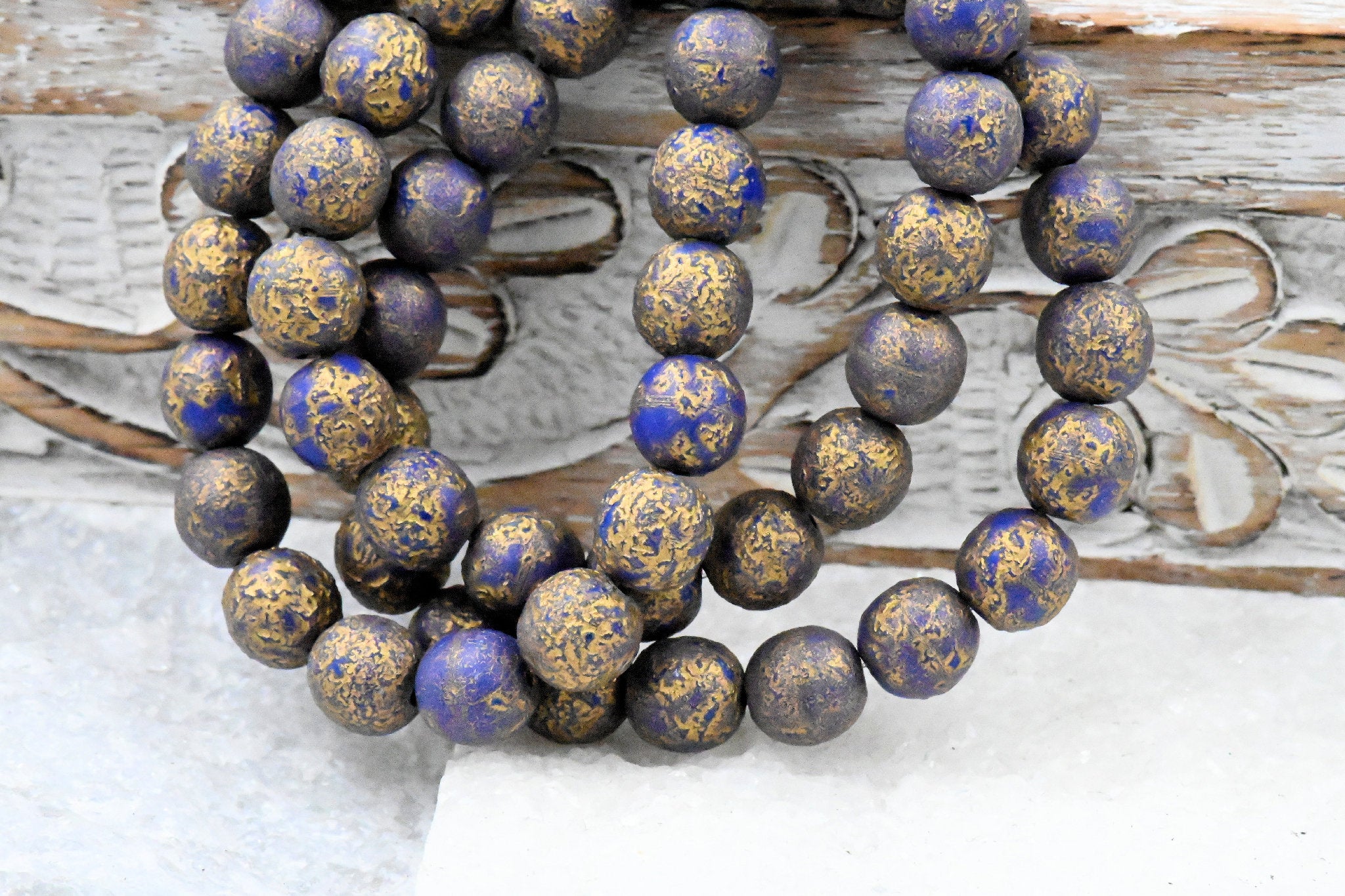 8mm Round Druk Lapis Blue with an Etched Finish Gold Wash