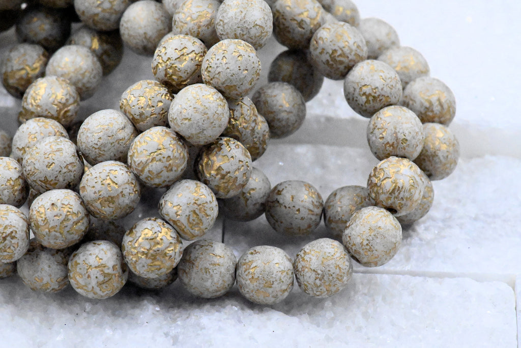 8mm Round Druk Mocha Cream with an Etched Finish Gold Wash