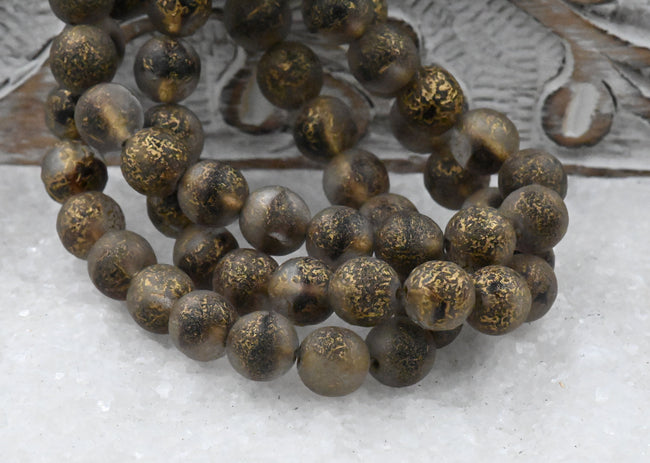 8mm Round Druk Spice Gold with an Etched Gold Finish Eggplant Accents Main Image