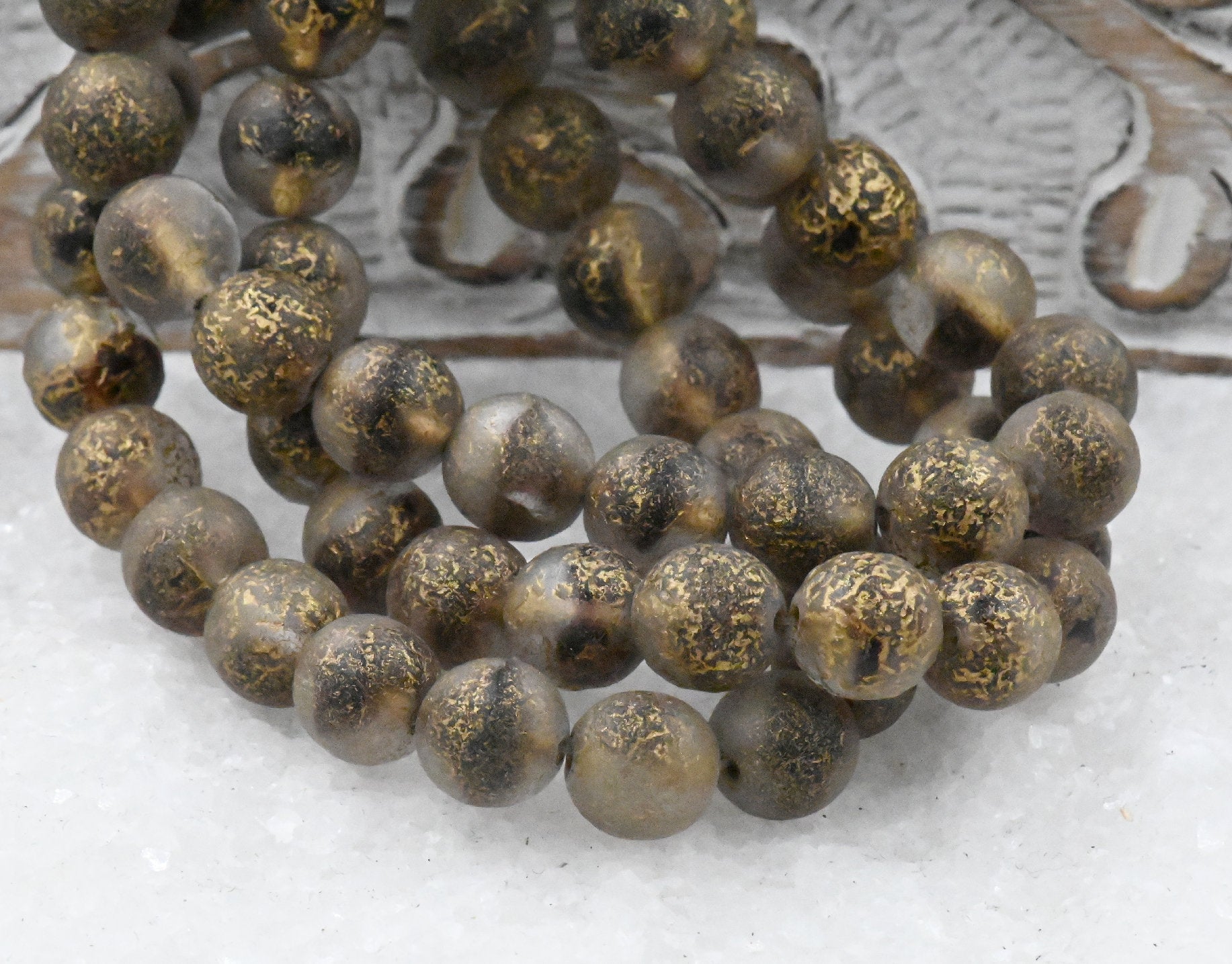 8mm Round Druk Spice Gold with an Etched Gold Finish Eggplant Accents