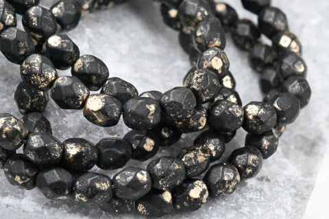 Black 6mm Faceted Czech, 50pc Gold Flake Finish