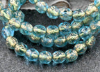 Aqua Blue Etched 6mm Faceted Czech, Gold Wash Finish