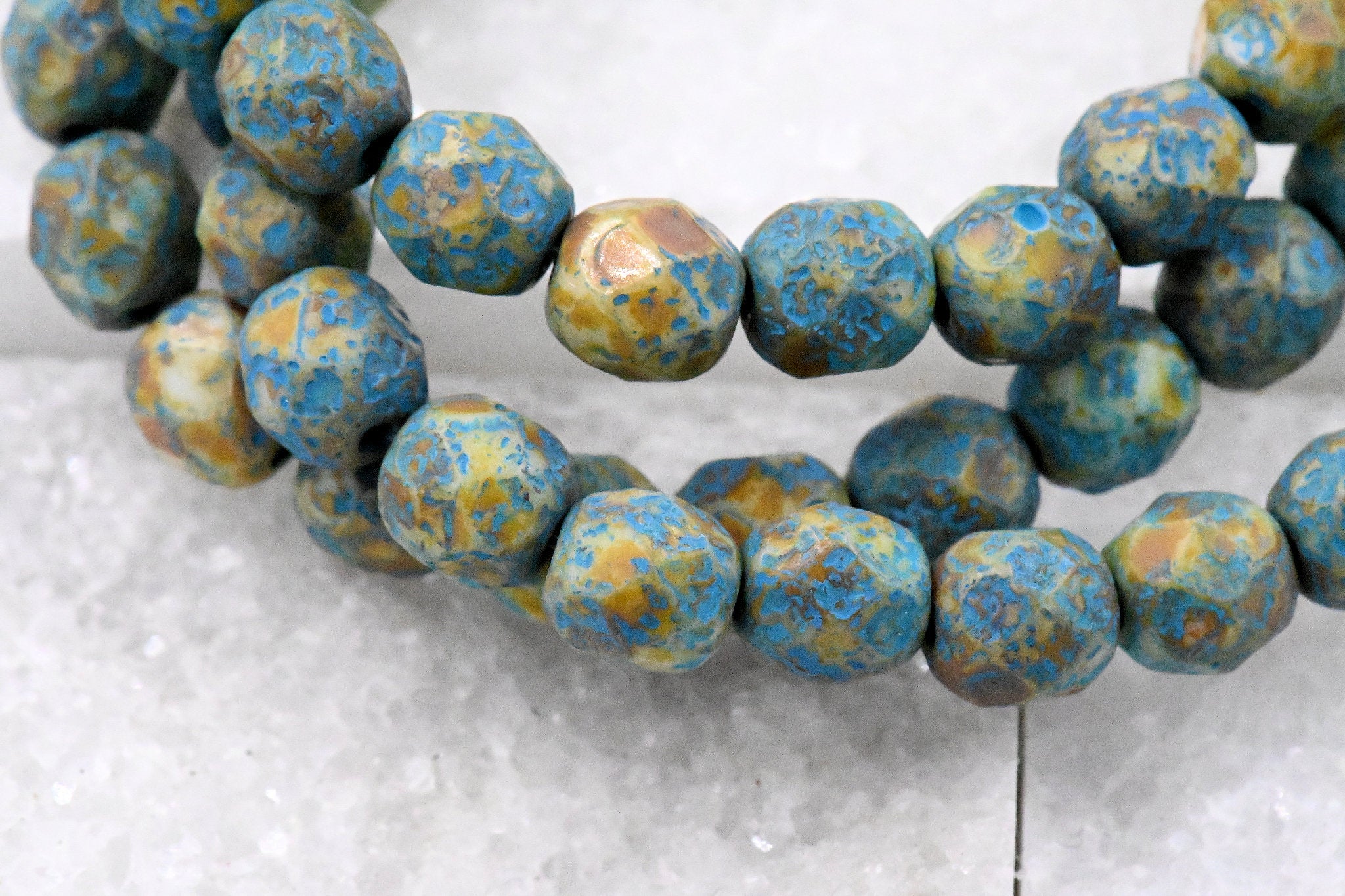 6mm Faceted Round Firepolished Bead Blue-green with an Etched and Picasso Finish and Turquoise Wash
