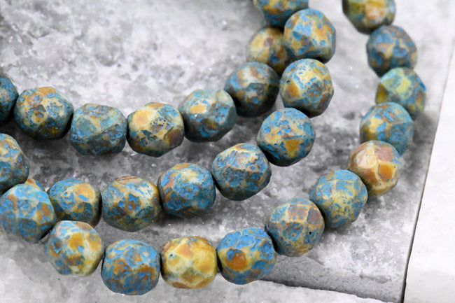 6mm Faceted Round Firepolished Bead Blue-green with an Etched and Picasso Finish and Turquoise Wash Hover Image