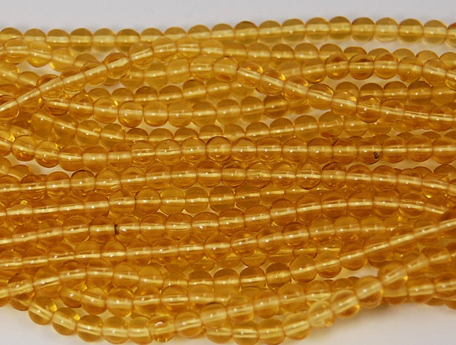 Medium Topaz 4mm round czech beads  - 100 Czech Beads Hover Image