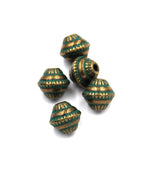 Antique Bronze/Green, 8mm bicone.  Sold per pkg of 25