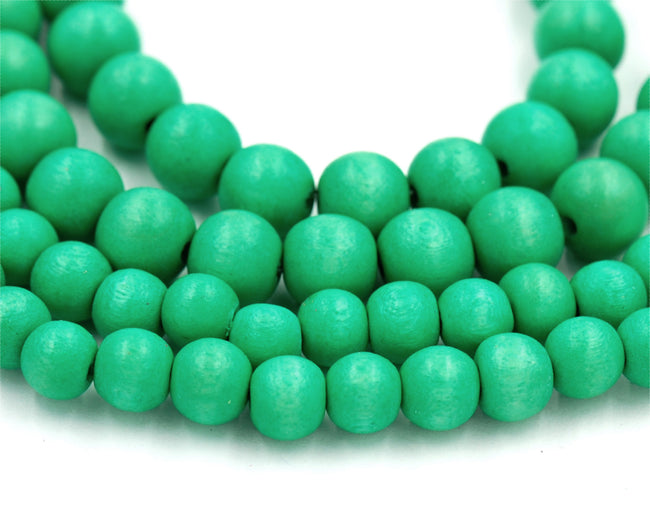Cabana Green Beads 6mm 8mm 10mm Boho Green Wood beads -16 inch strand Hover Image
