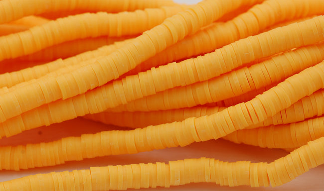 Flat Round Handmade Polymer Clay Bead Spacers, Sunflower Yellow, 6x1mm Hover Image