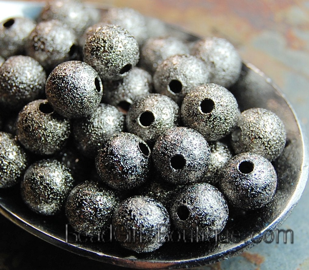 Gunmetal Grey Stardust covered Brass 8mm Beads- 25